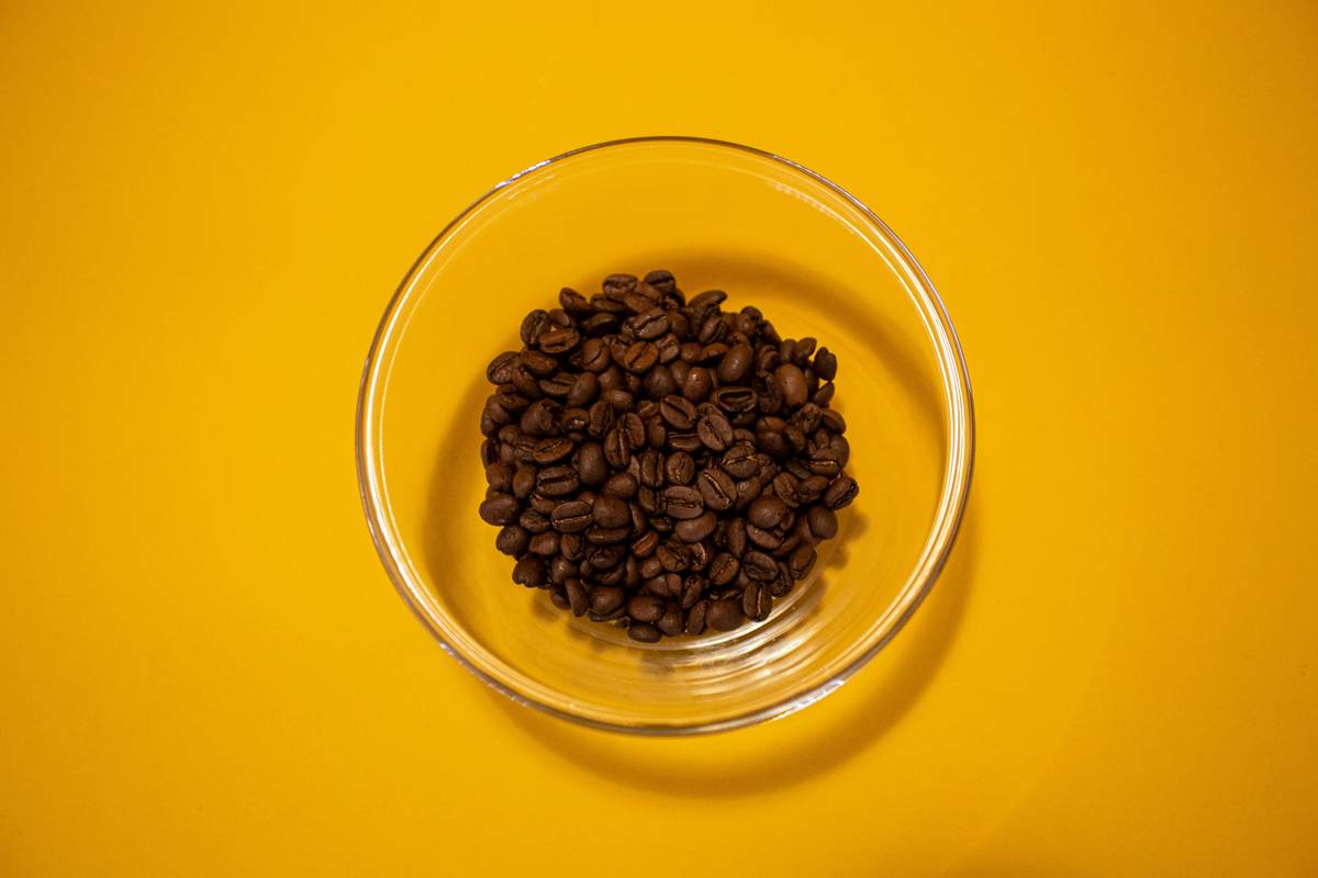Specialty Bean Recommendations displayed alongside a smart coffee maker and fresh coffee beans